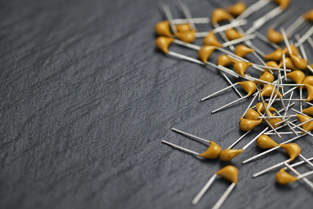 Heap of yellow multilayer ceramic capacitors