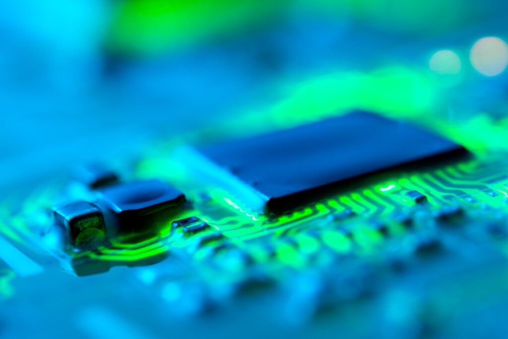 Electronic circuit board close up with green backlight