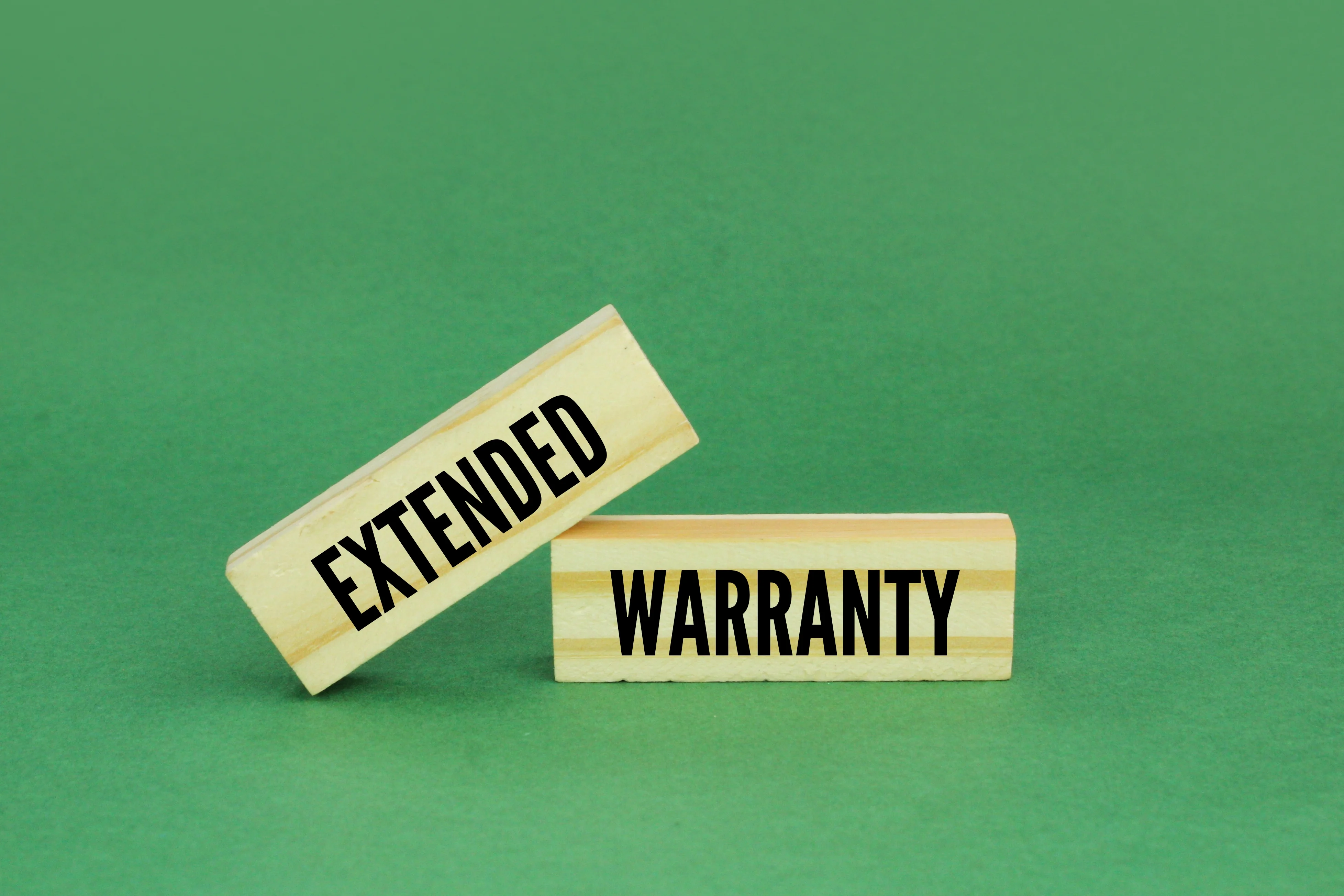 wood with the word Extended Warranty.